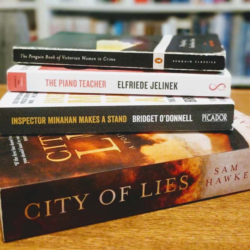 A pile of books on a table