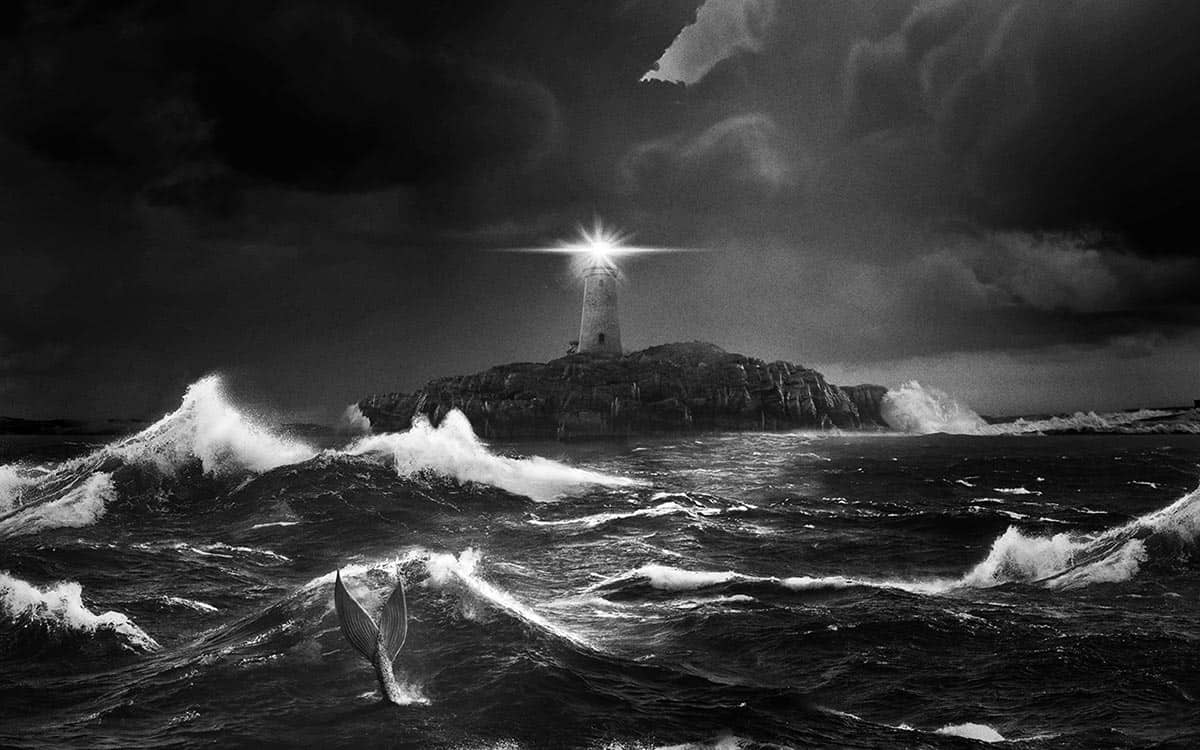 Still from the Lighthouse movie of a lighthouse in a storm